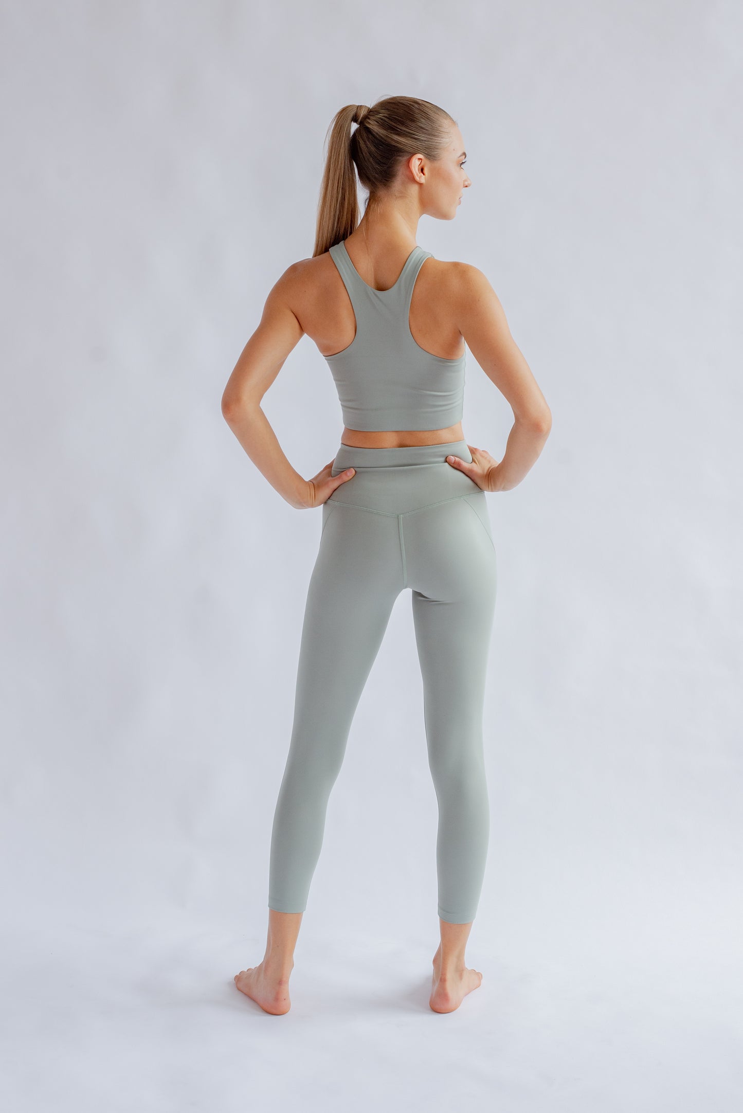 Racer back sports bra tank in green - Girlfriend Collective